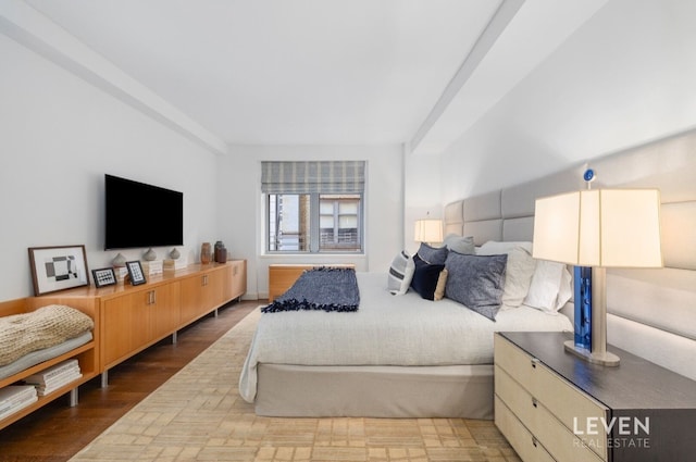 bedroom with hardwood / wood-style flooring