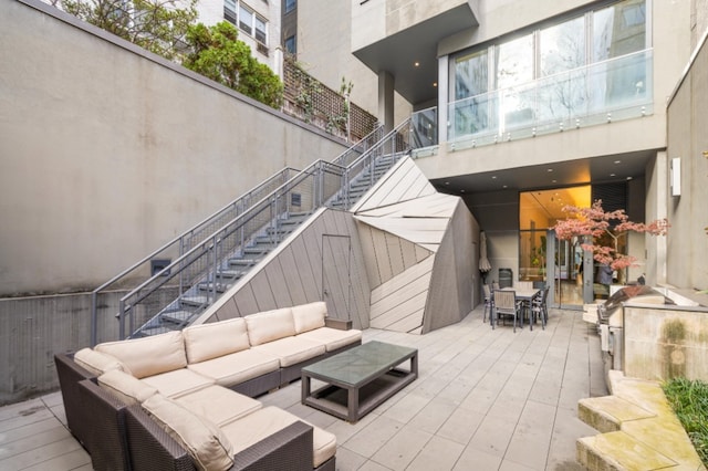 exterior space featuring stairs and hardwood / wood-style floors