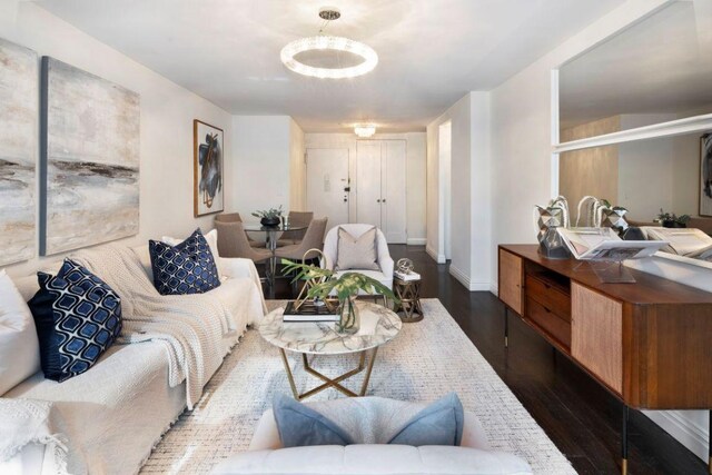 living room featuring dark wood-type flooring