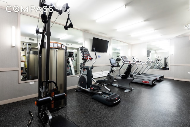 gym with visible vents and baseboards