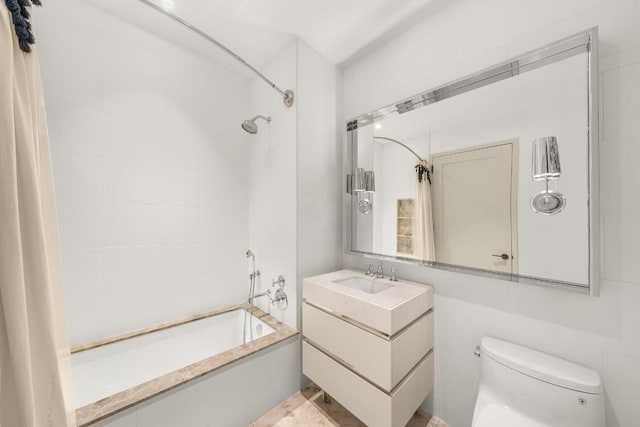 bathroom featuring shower / tub combo, vanity, and toilet