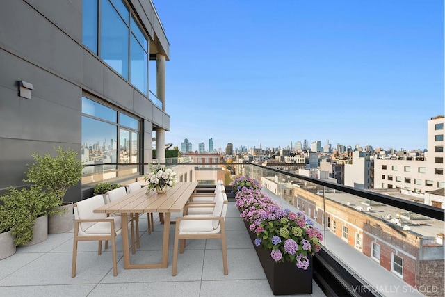 balcony featuring a city view