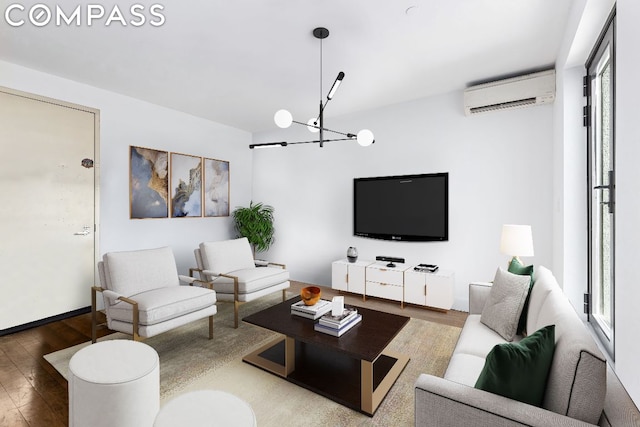 living room featuring an AC wall unit, a notable chandelier, plenty of natural light, and hardwood / wood-style floors