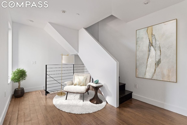 living area featuring hardwood / wood-style floors