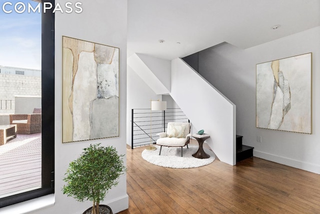 sitting room featuring hardwood / wood-style flooring