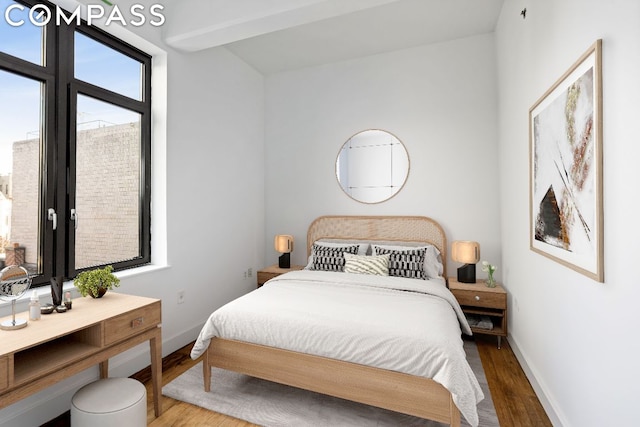 bedroom with wood-type flooring