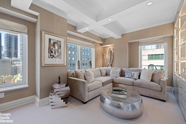 carpeted living room with ornamental molding, a view of city, beamed ceiling, and baseboards