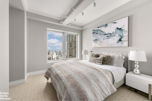 bedroom featuring crown molding, light colored carpet, and baseboards