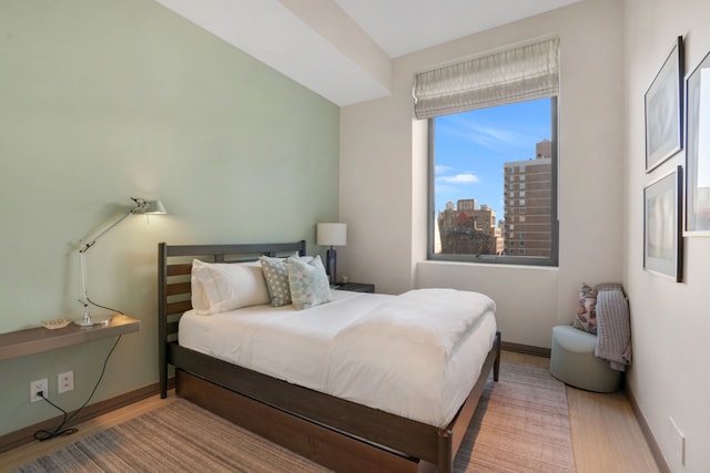 bedroom featuring hardwood / wood-style floors