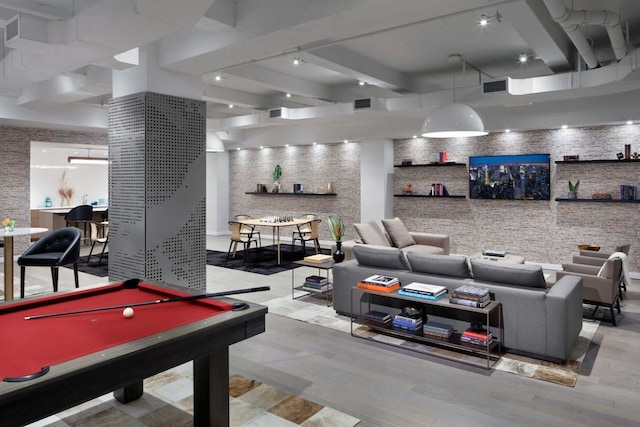 recreation room with light hardwood / wood-style floors and pool table