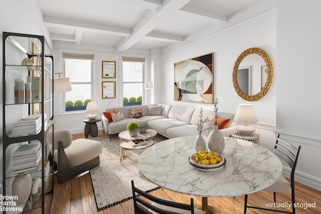 living room featuring wood-type flooring, beam ceiling, and coffered ceiling