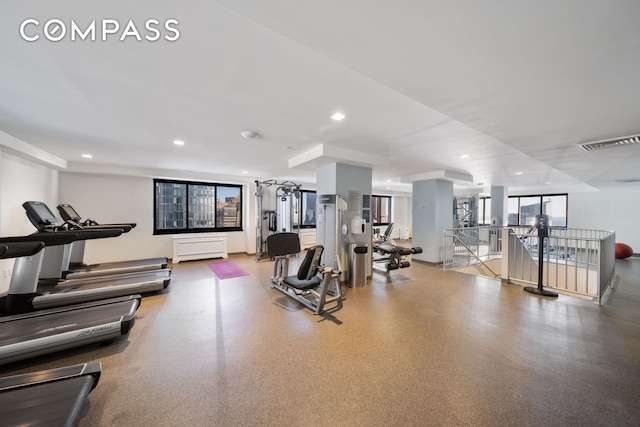 exercise room featuring recessed lighting and visible vents