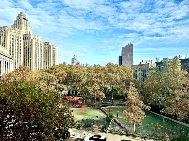 surrounding community featuring a city view