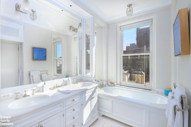 bathroom featuring double vanity, ornamental molding, a bath, and a sink