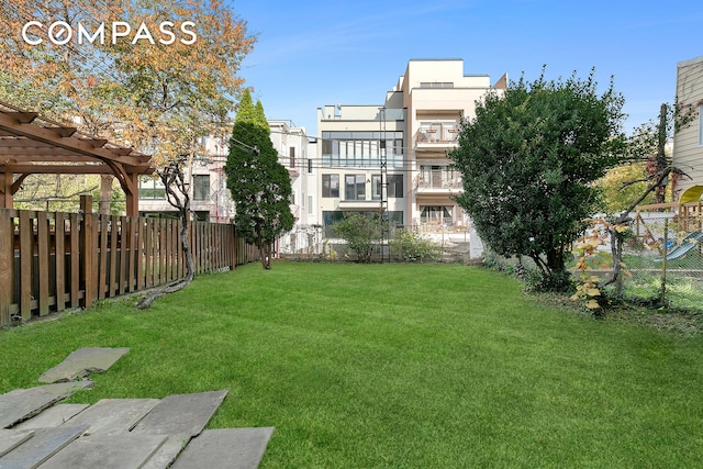 view of yard with a fenced backyard and a pergola