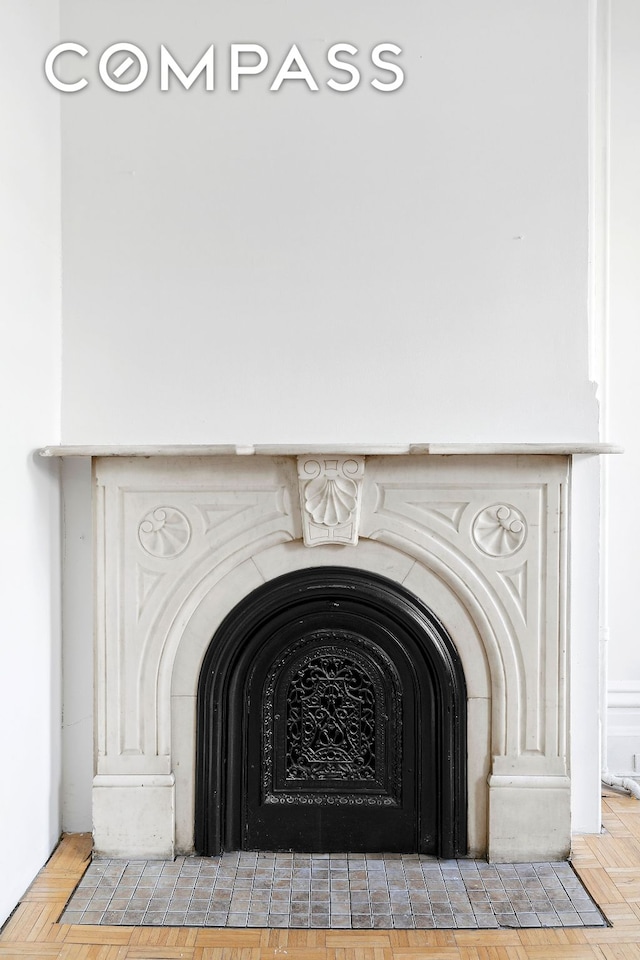 details with a fireplace with flush hearth