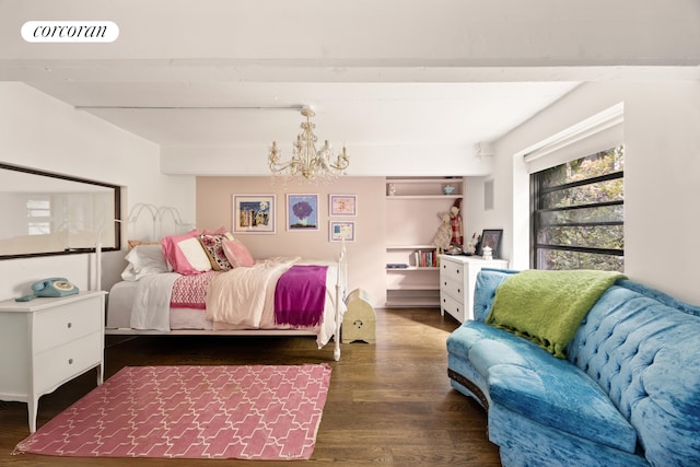 bedroom featuring dark wood-style flooring, visible vents, beam ceiling, and an inviting chandelier