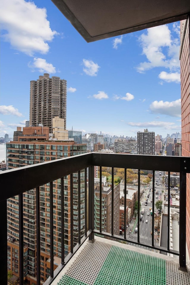 balcony featuring a city view