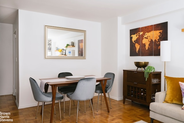 dining room with parquet floors