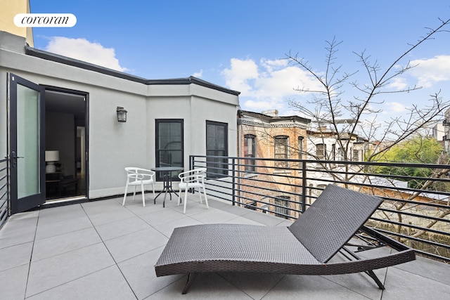 view of patio / terrace featuring a balcony