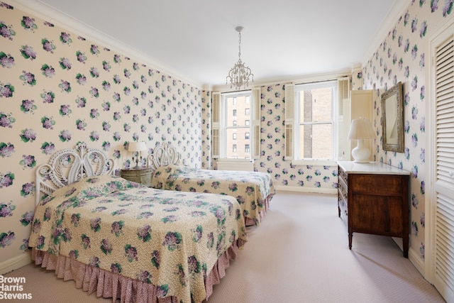 carpeted bedroom featuring baseboards, crown molding, and wallpapered walls