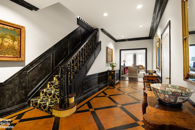 interior space featuring stairs, crown molding, and recessed lighting