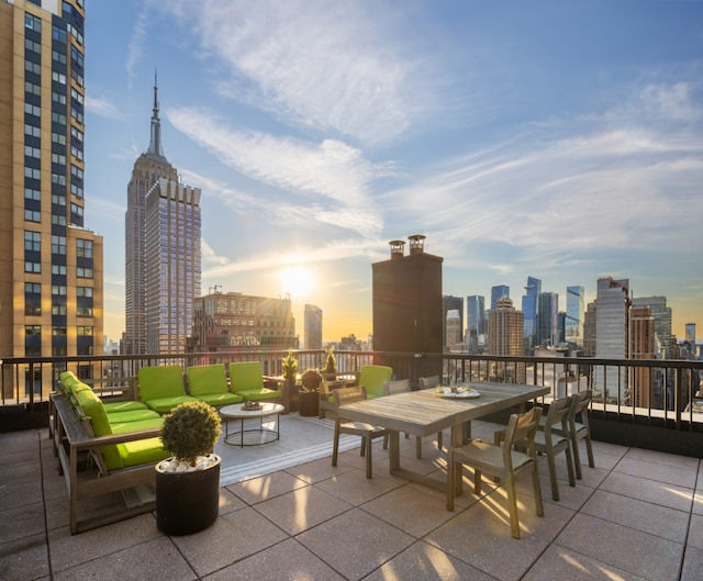 patio terrace at dusk with an outdoor hangout area