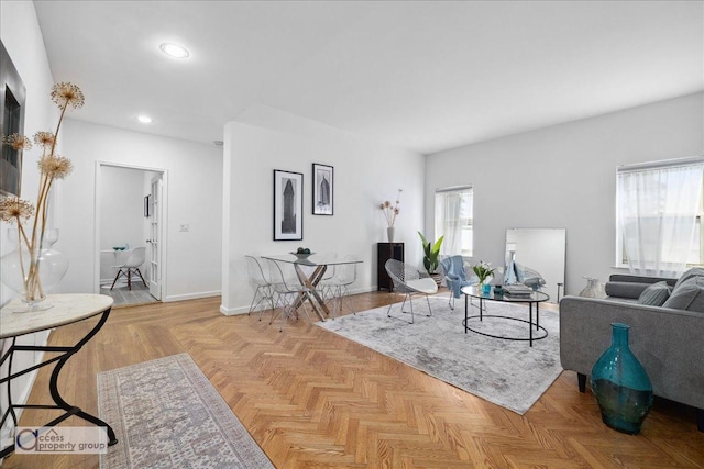 living room featuring light parquet flooring