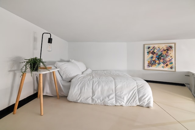 bedroom featuring lofted ceiling