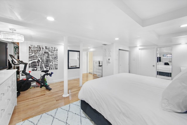 bedroom with light hardwood / wood-style flooring