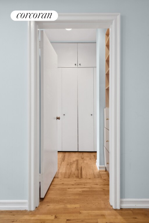 hallway featuring light hardwood / wood-style flooring