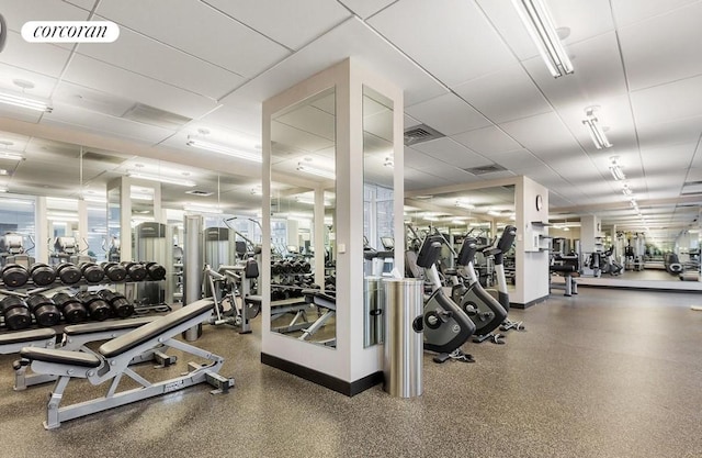 gym with a drop ceiling