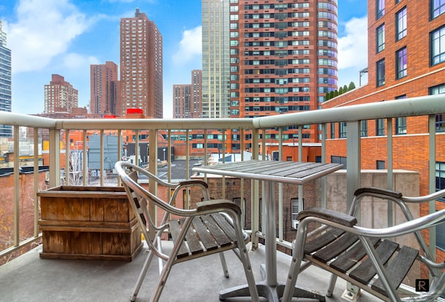 balcony featuring a view of city