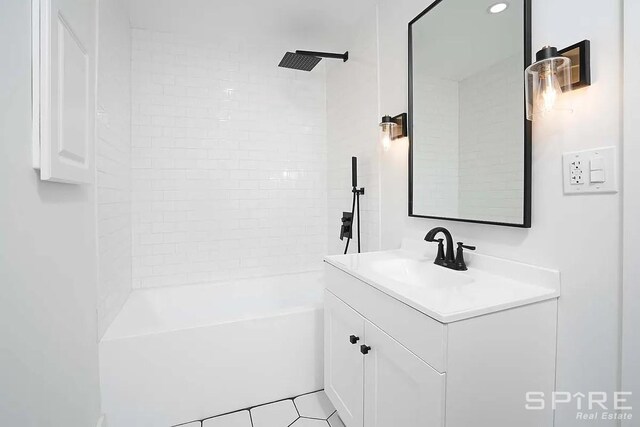 bathroom featuring vanity and bathtub / shower combination