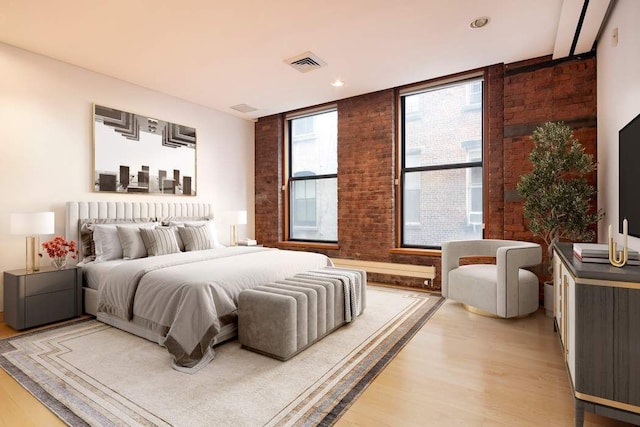 bedroom featuring light wood-type flooring