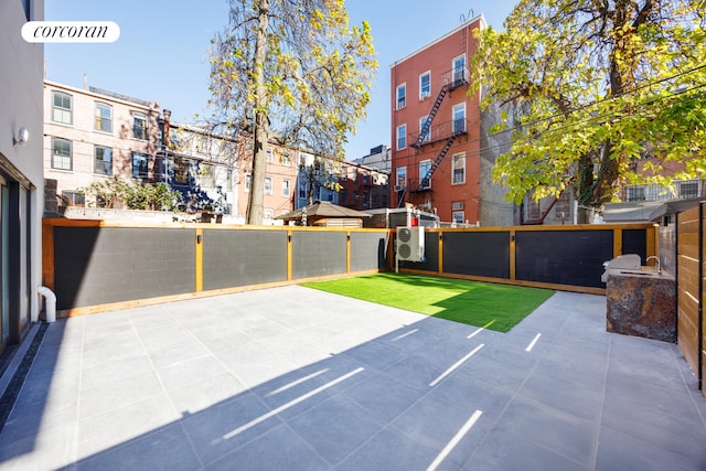 view of patio with fence