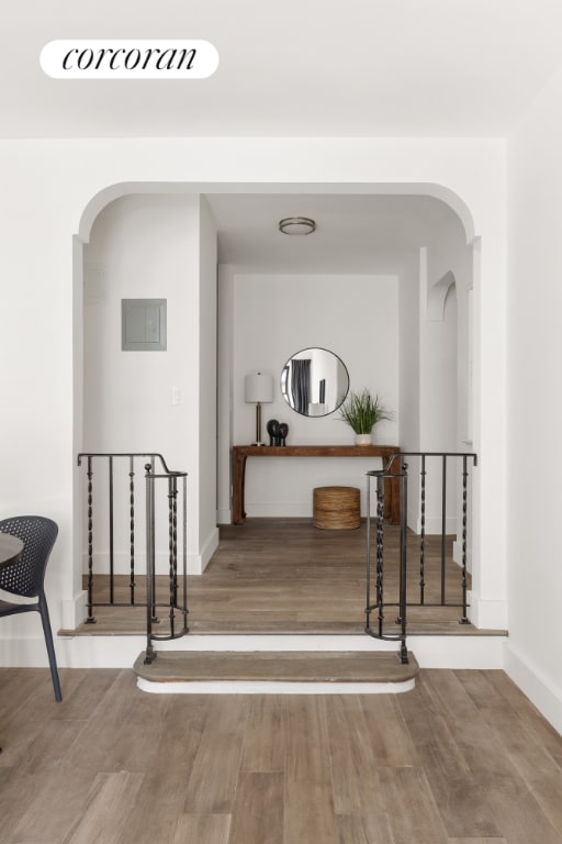 hallway featuring hardwood / wood-style flooring