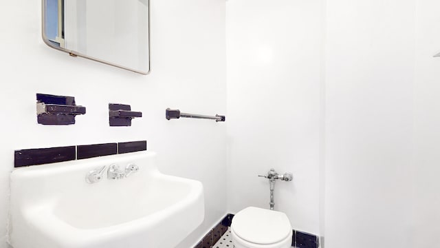 25 Indian Rd Unit 2G, New York City, NY 10034 - bathroom featuring toilet and a sink
