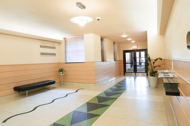 building lobby featuring visible vents