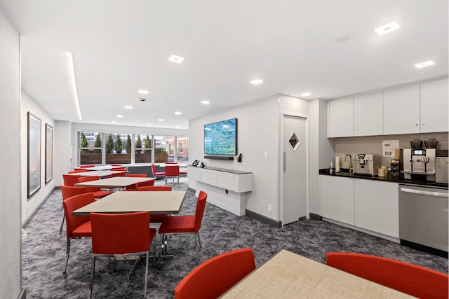 360 E 72nd St Unit B804, New York City, NY 10021 - dining room with dark carpet and recessed lighting