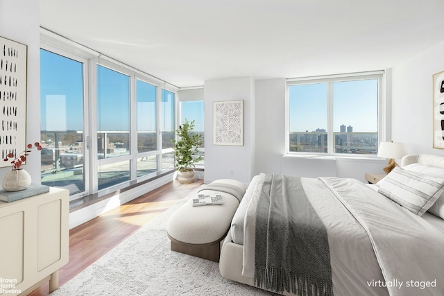 bedroom with light hardwood / wood-style floors