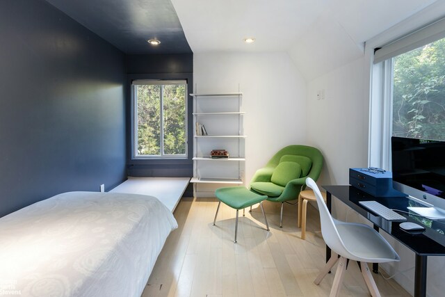 bedroom featuring recessed lighting and light wood-style flooring