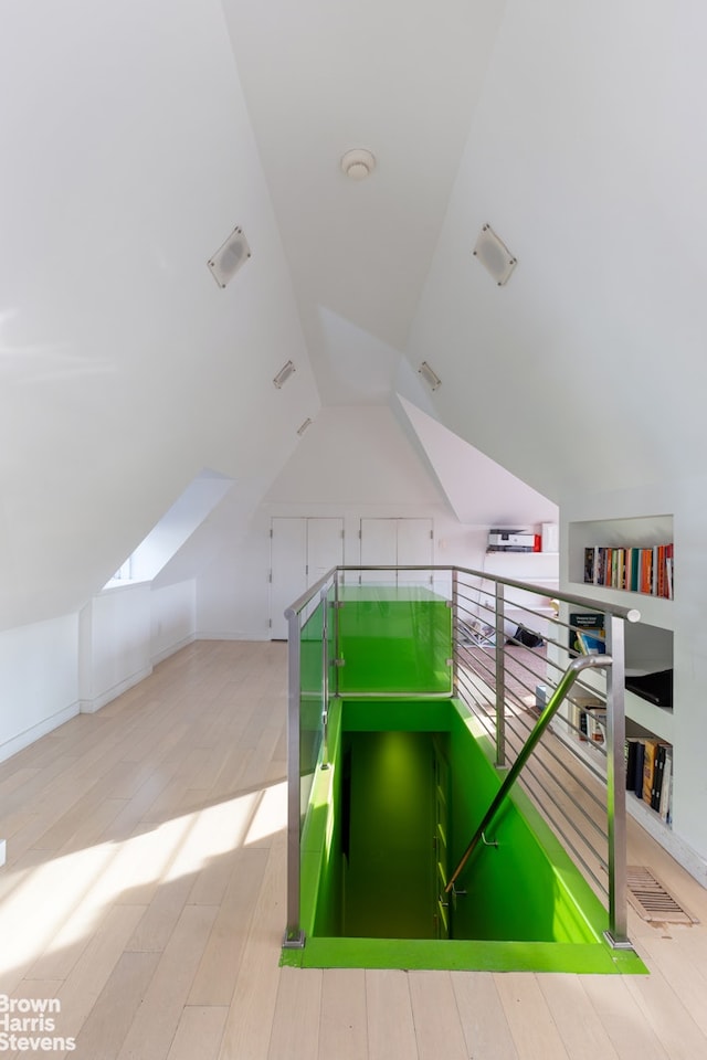 800 W 231st St, New York City, NY 10463 - bonus room with wood finished floors and vaulted ceiling