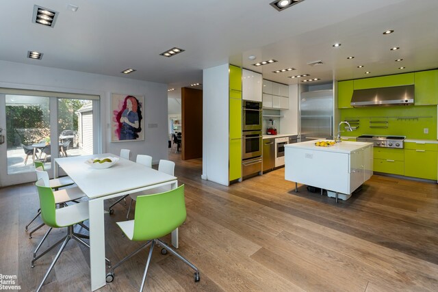 800 W 231st St, New York City, NY 10463 - dining space with light wood-style flooring and recessed lighting