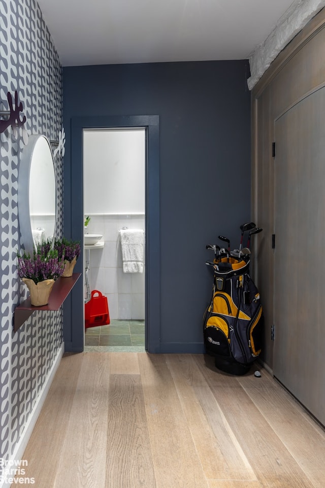 800 W 231st St, New York City, NY 10463 - corridor with wallpapered walls and wood finished floors