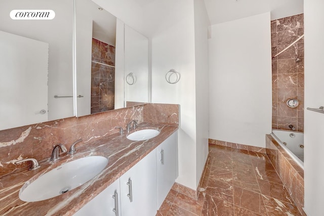 343 E 74th St Unit Ph34D, New York City, NY 10021 - full bath featuring baseboards, marble finish flooring, a tub with jets, double vanity, and backsplash