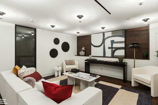 living area featuring dark wood-style floors