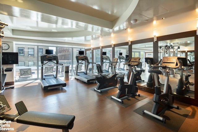 exercise room with wood finished floors