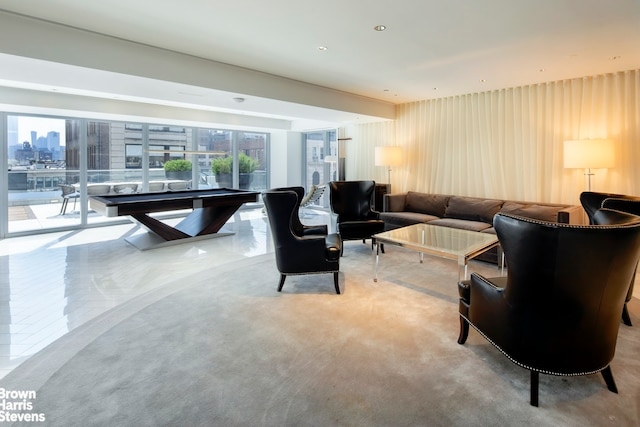 living room featuring a view of city and light carpet