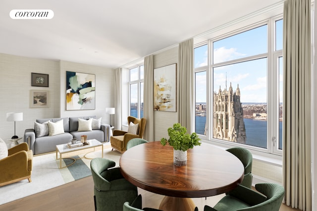 100 Claremont Ave Unit 36B, New York City, NY 10027 - dining room featuring wood finished floors and a water view